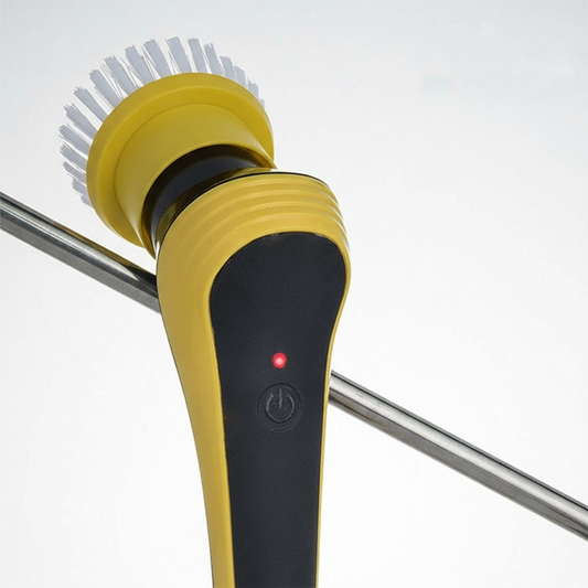 Yellow and black kitchen brush with bristle head on a white background